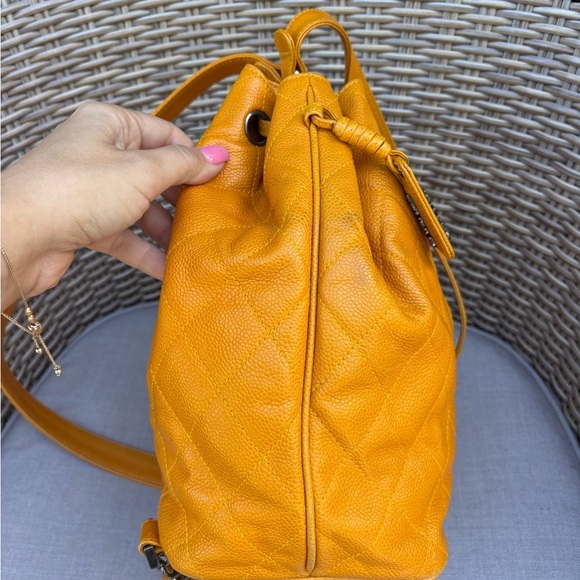 Authentic CHANEL Mustard caviar leather quilted drawstring backpack main image 8